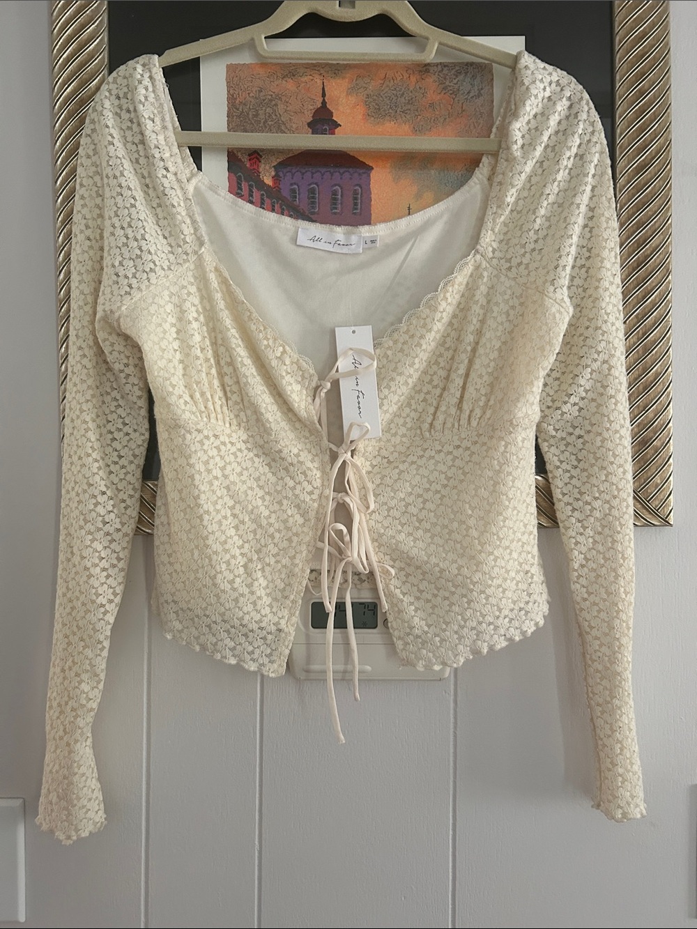 All in Favor Cream Crochet Lace-Up Long Sleeve Top